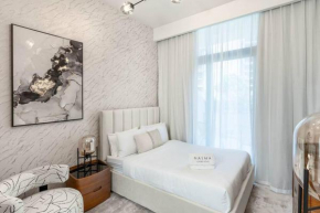 Nasma Luxury Stays - Trendy & Stylish Living Studio at Azizi Riviera 41